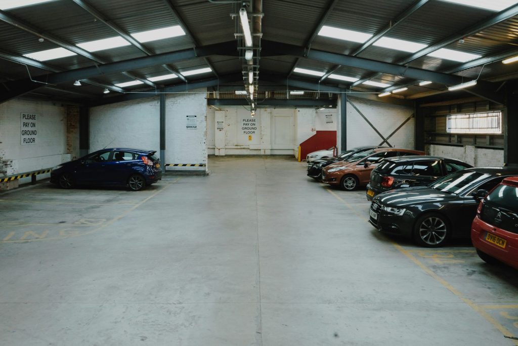 Indoor parking lot with multiple parked cars